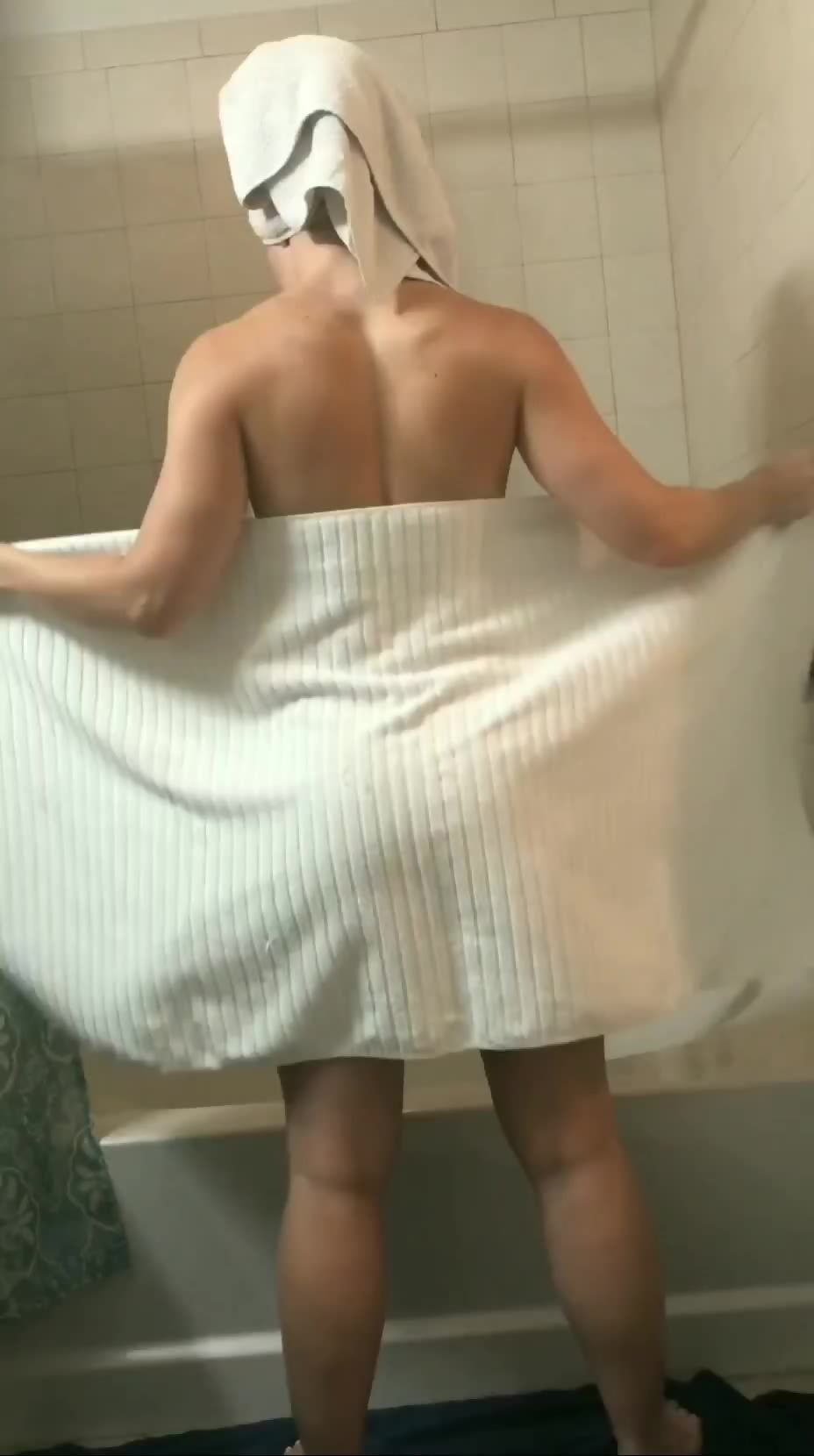 Naked ass under a towel