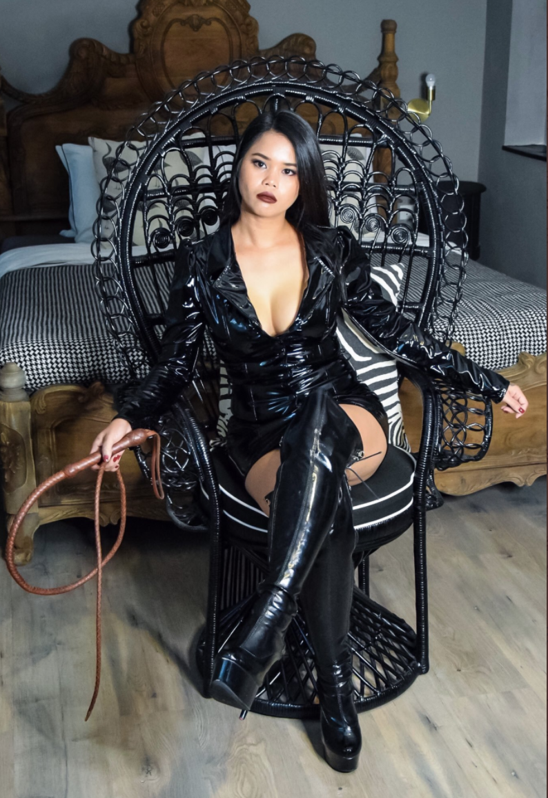 Asian in latex with whip