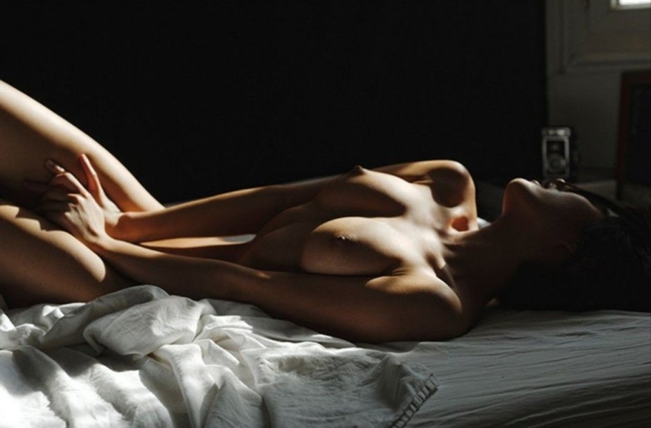 Naked beauties in bed
