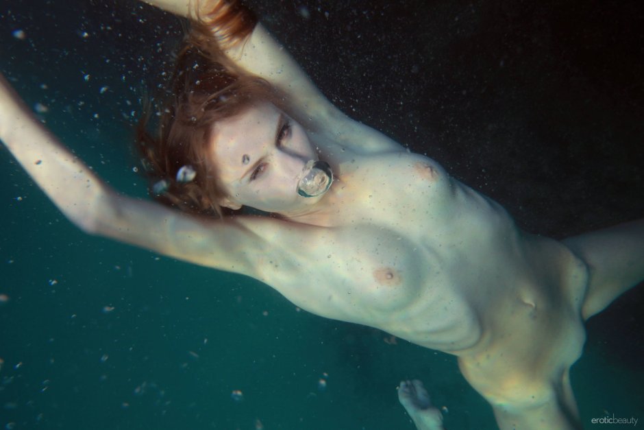 Submarine swimming a woman nude