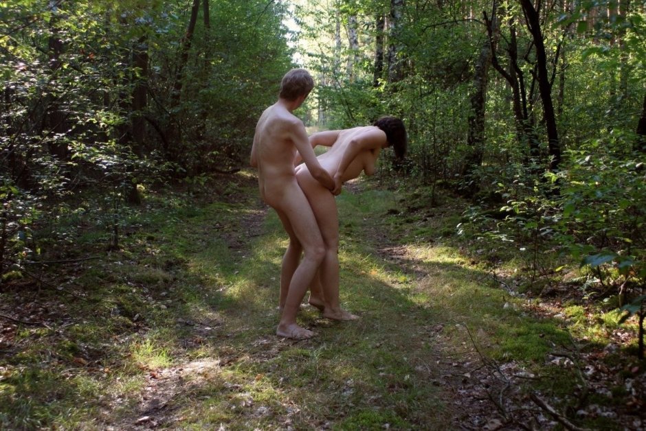 Naked men and women in nature