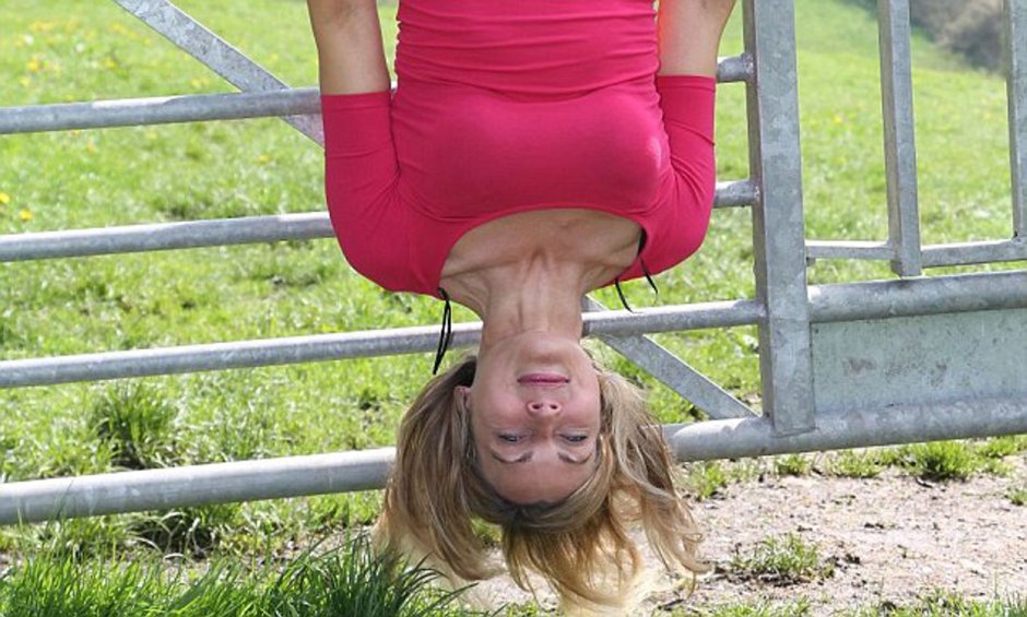 Girl On Ladder Upside Down
