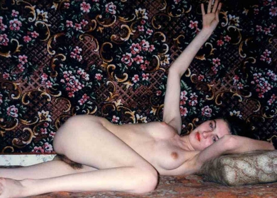 Naked girls on the background of the carpet
