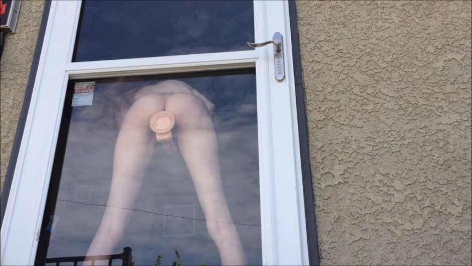 Naked in the window lit up