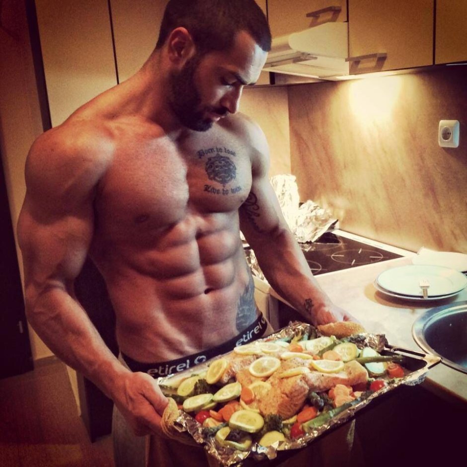 Naked man in the kitchen