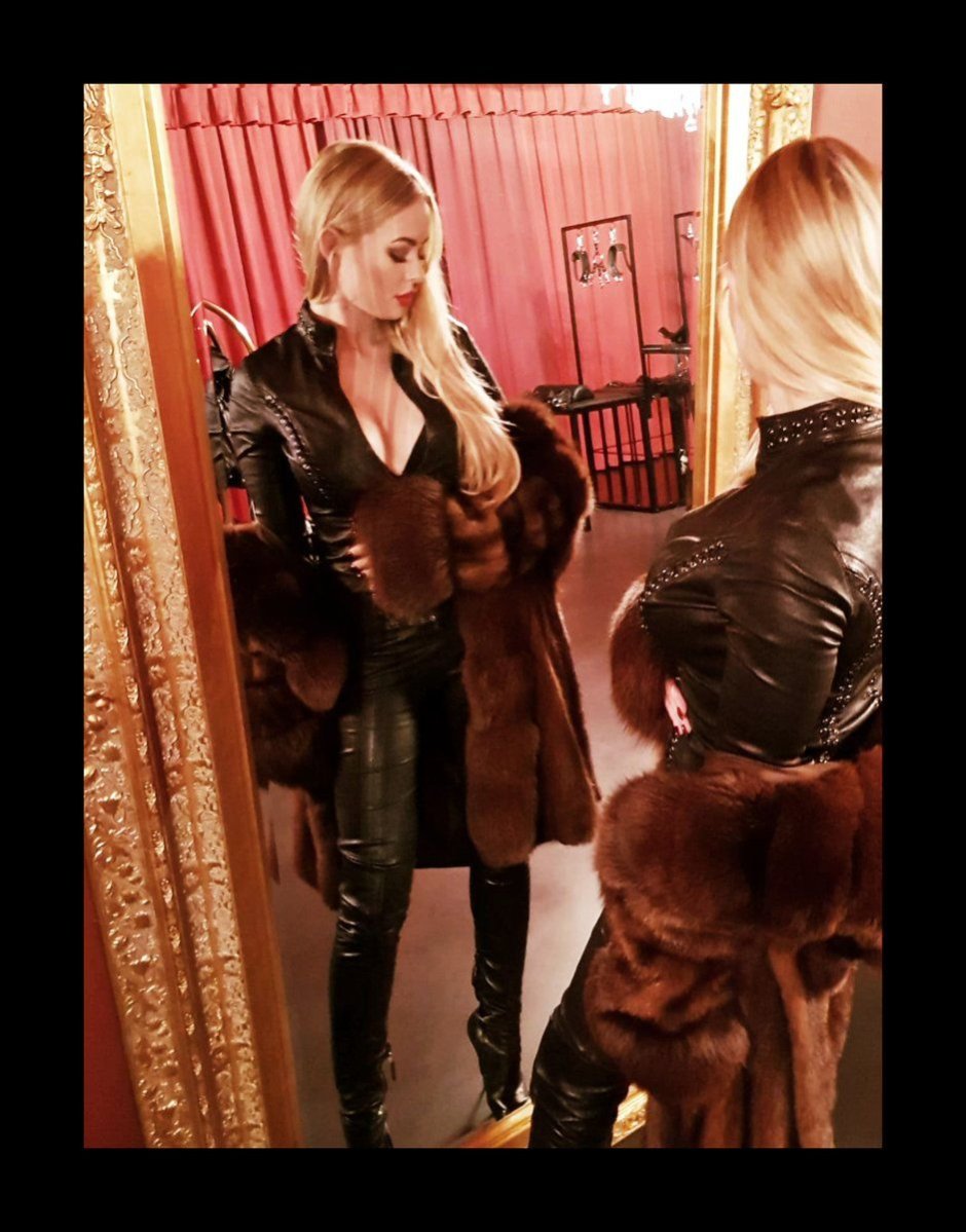 Women in a fur coat and boots