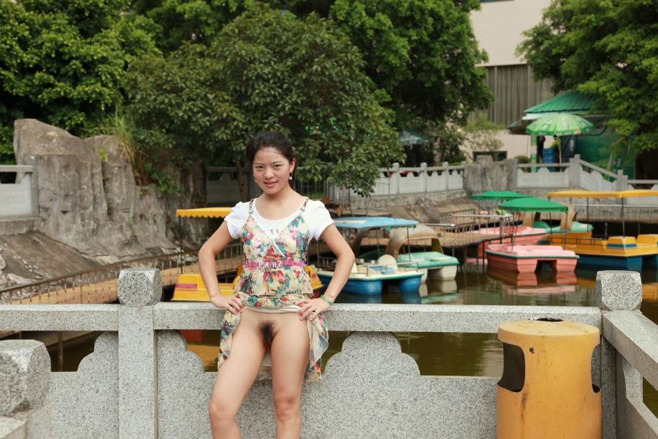 Chinese woman undressed on the street