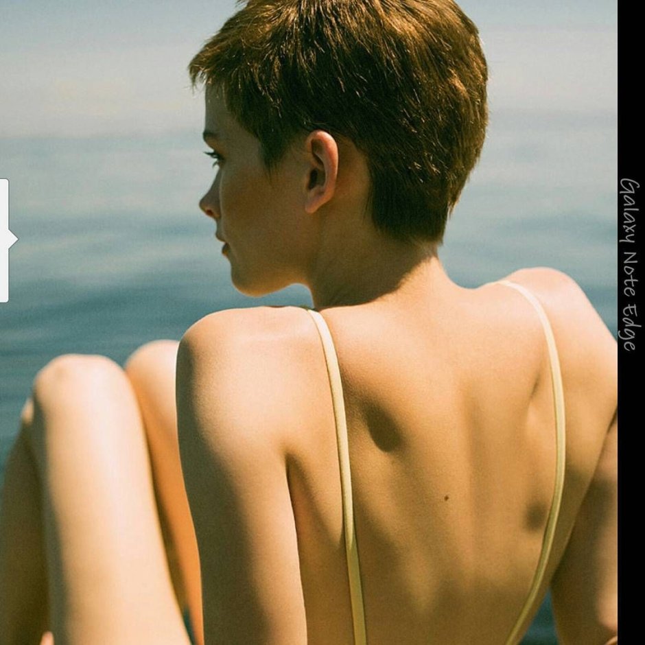 Slender girl with a short haircut