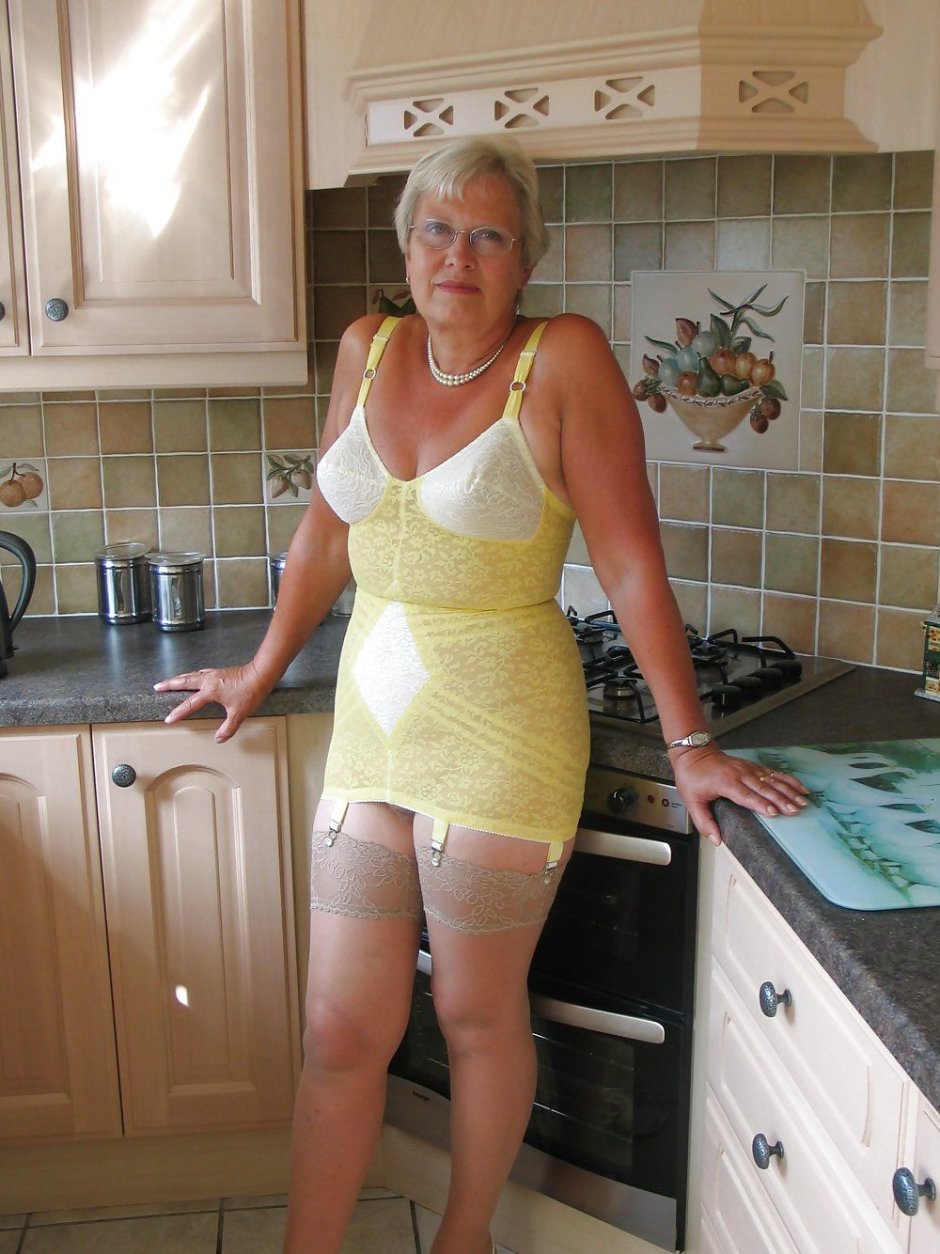 Mature wife in an erotic suit