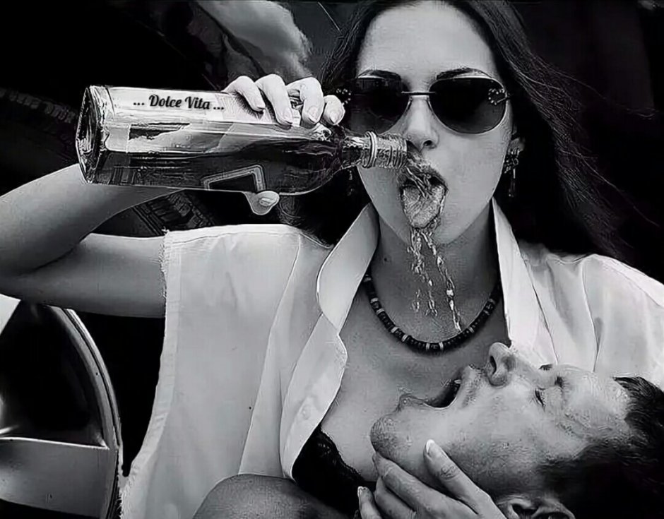 Girl with a cigar and whiskey