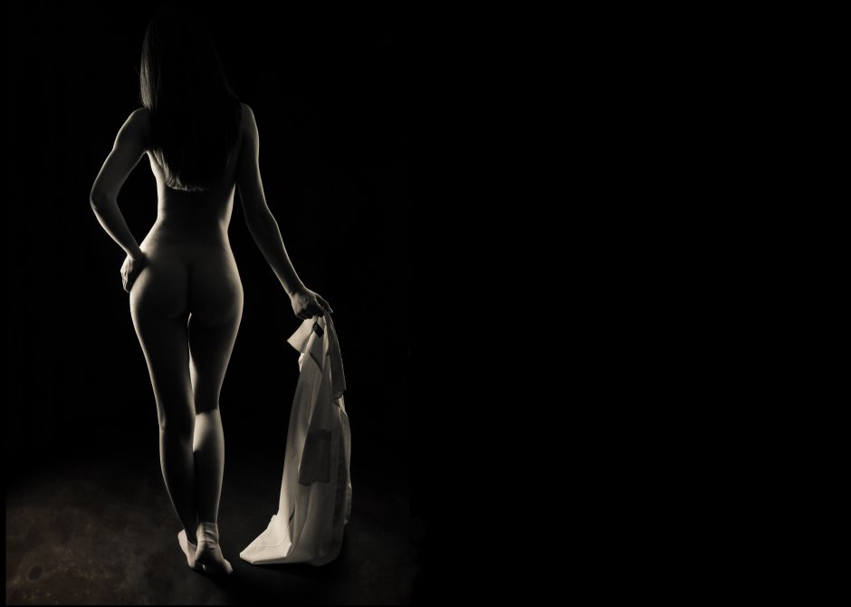 Naked butt on a black background