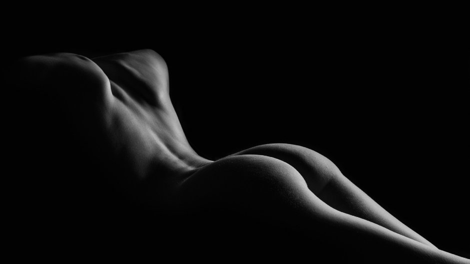 Nude on a black background