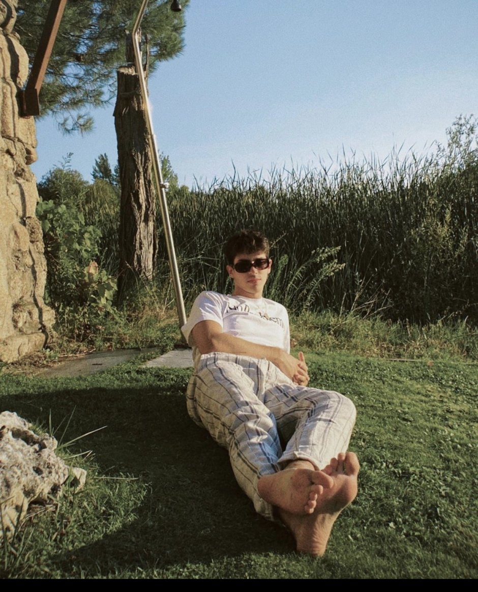 Manu Rios on the beach
