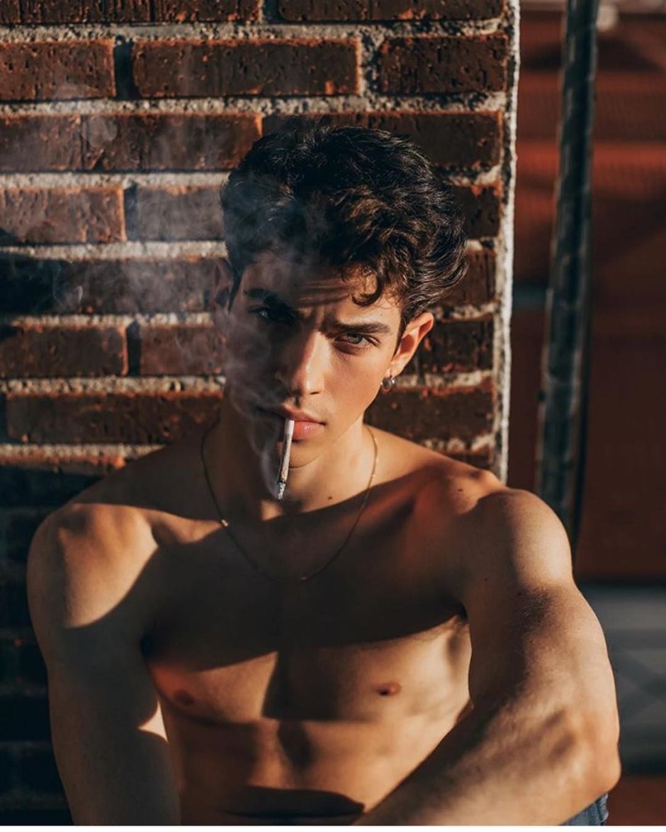 Manu Rios with a tongue
