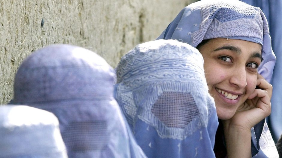 Afghan woman in a burden