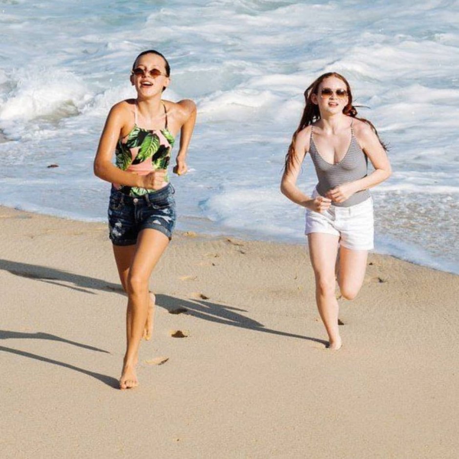 Millie Bobby Brown and Sadie Sink in a swimsuit