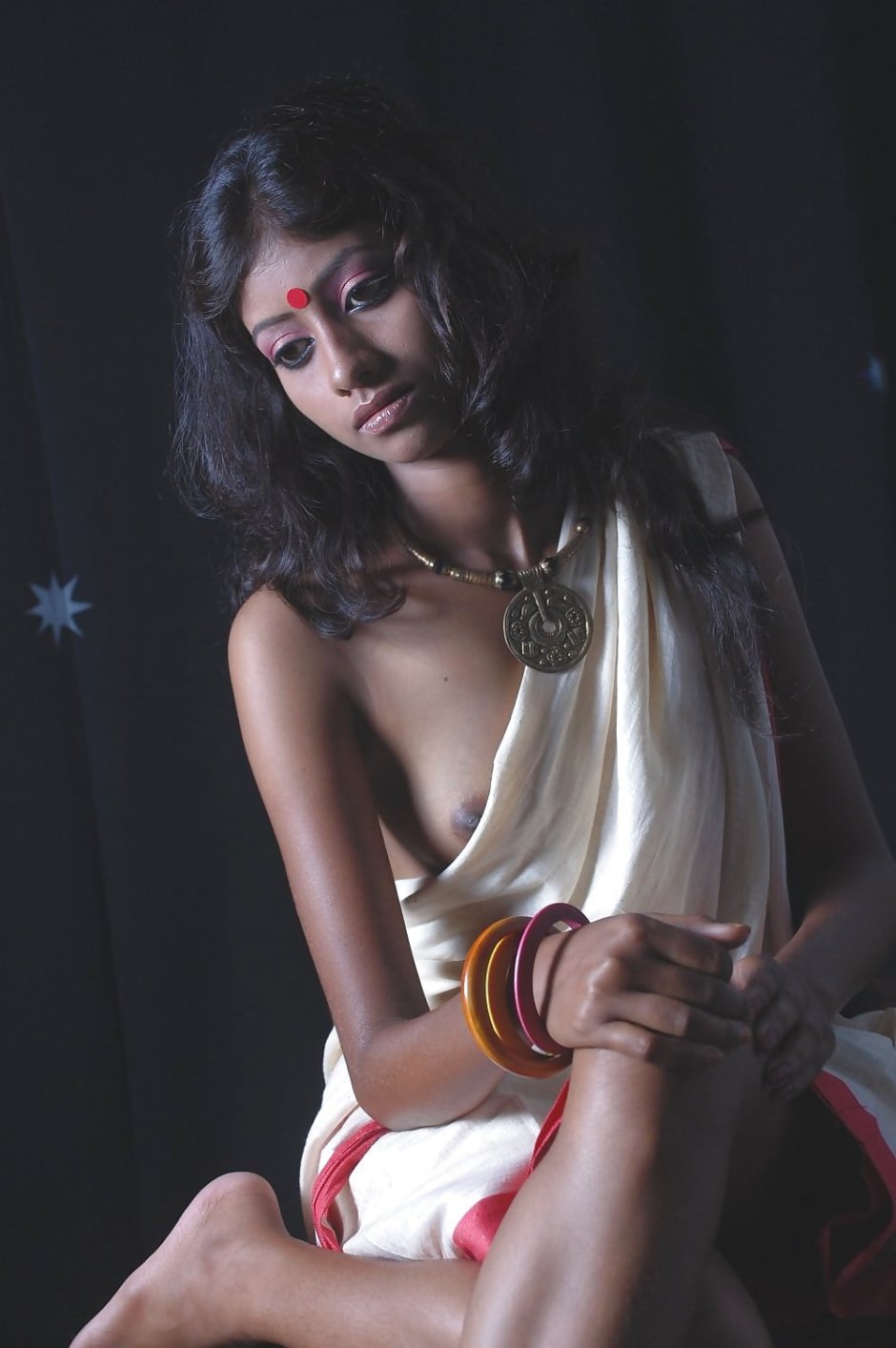 Eastern women topless