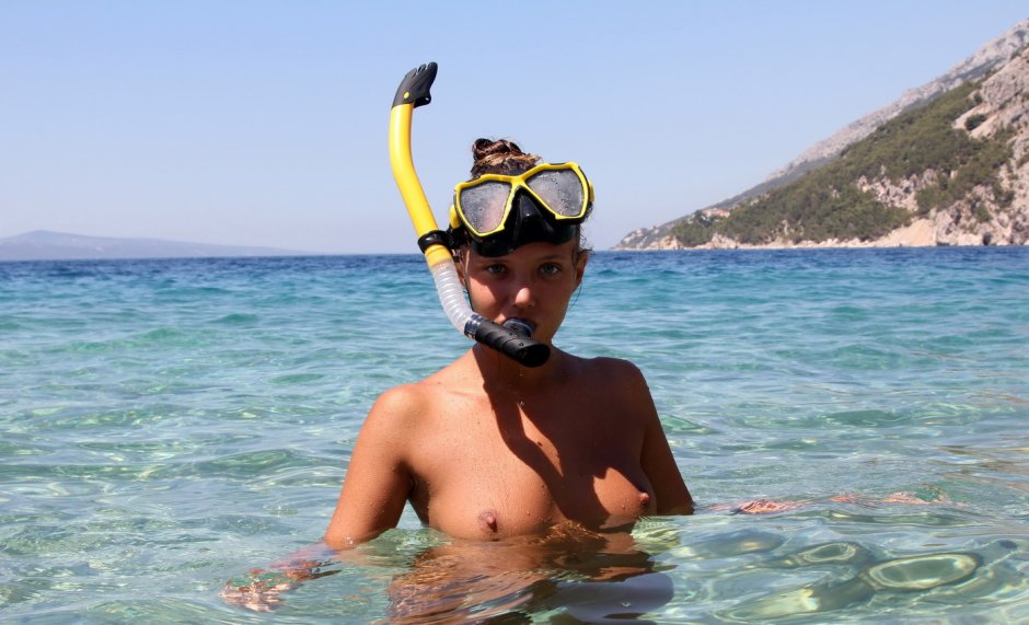 Naked on the shore in flows