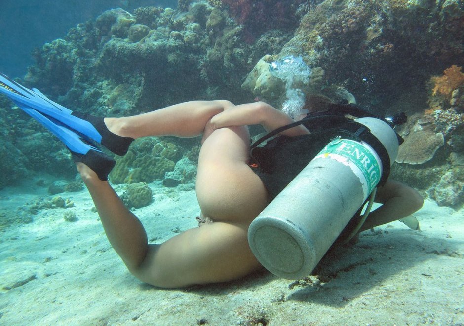 Naked divers underwater