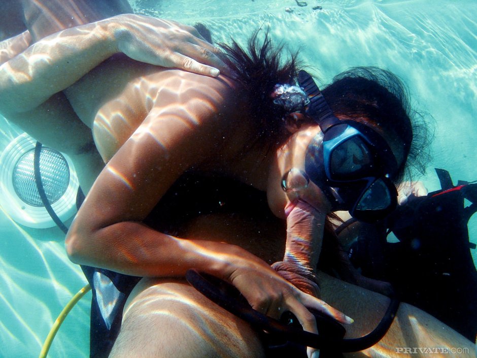 Naked with scuba dummy underwater