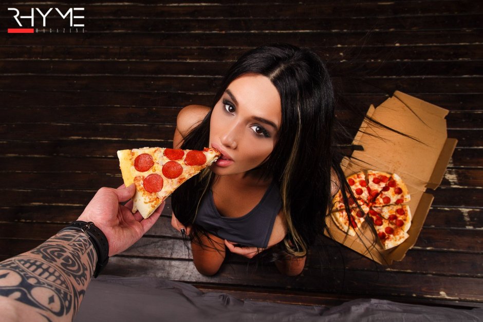 Beautiful girl with pizza