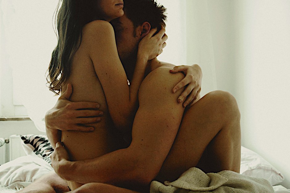 The guy hugs a naked woman