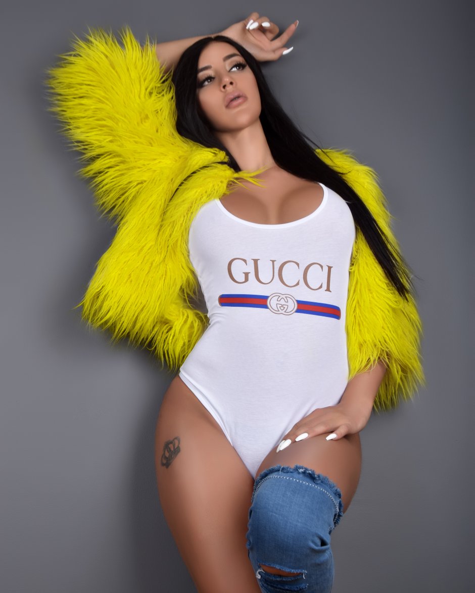 Dilara in the swimsuit of the priest