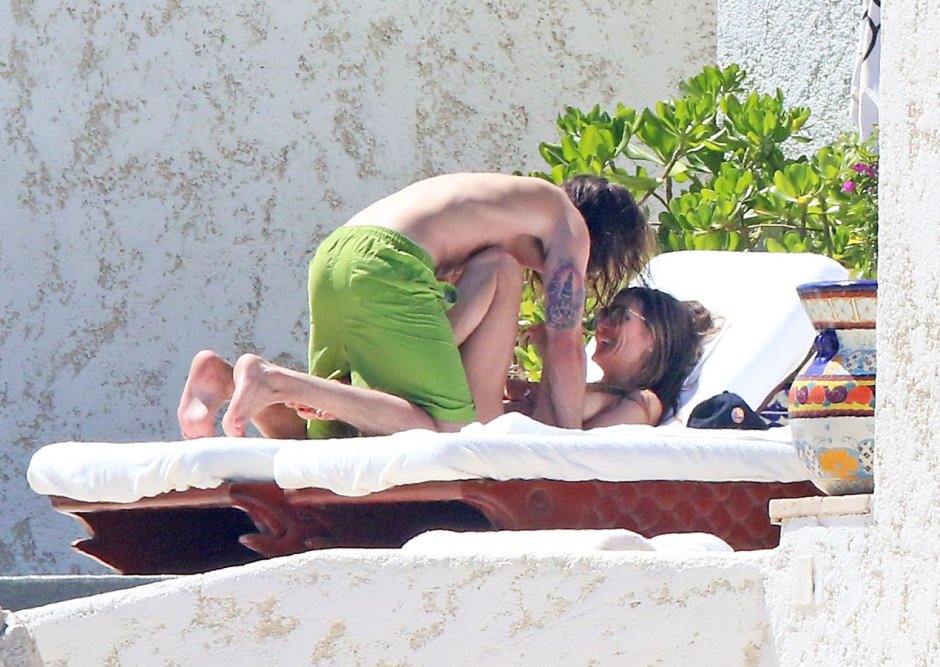 Heidi Klum and Tom Kaulitz on the beach