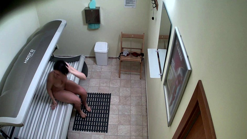 Girls sunbathe in the solarium naked