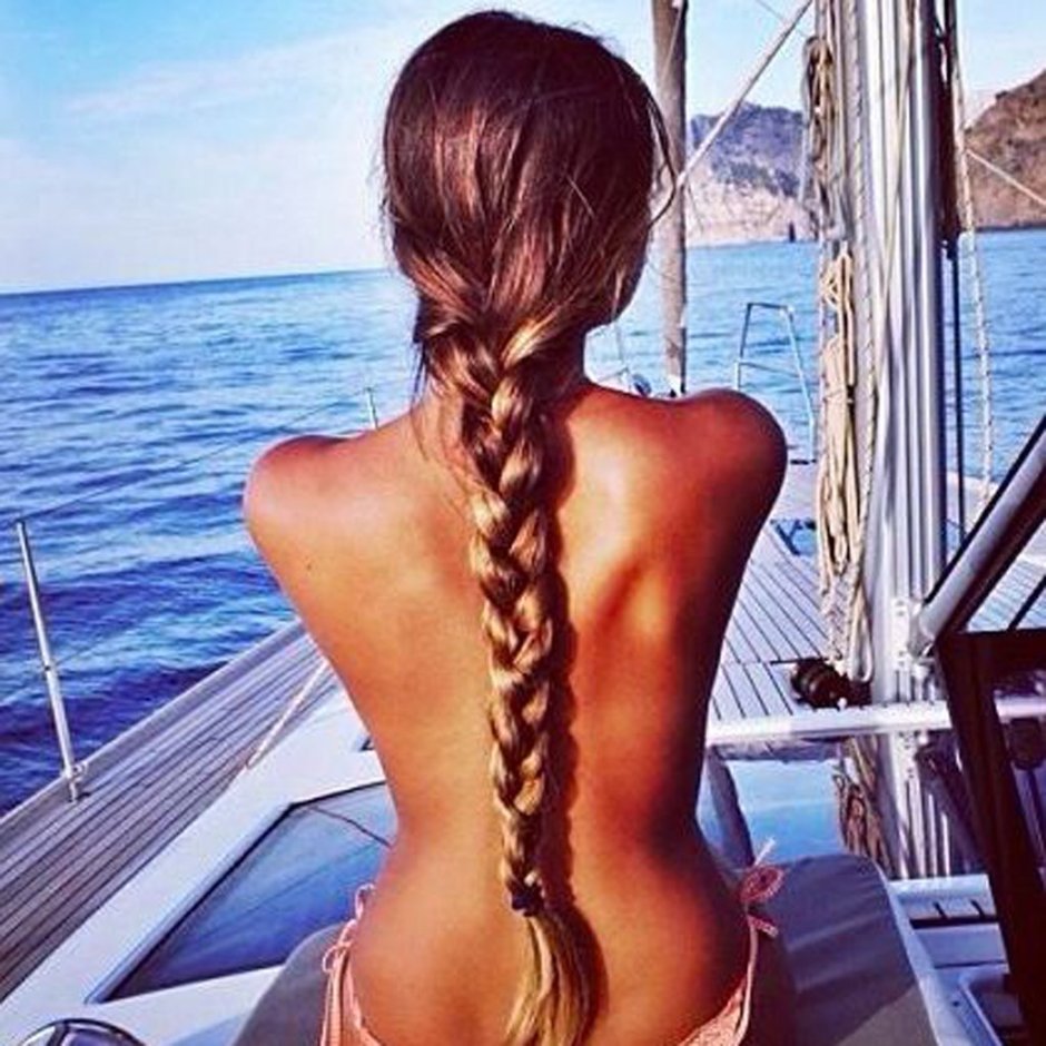 Girl with a blond scoop from the back