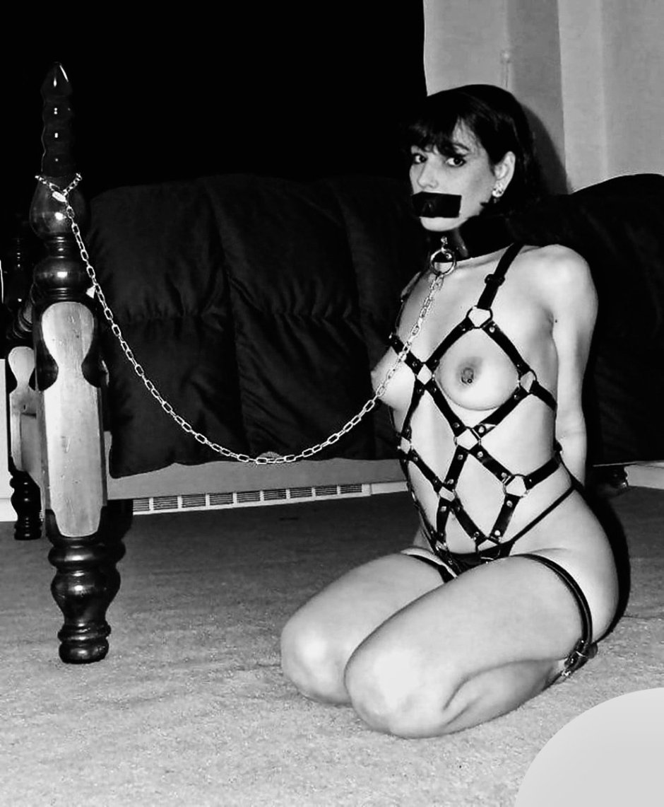 Naked women with tied hands