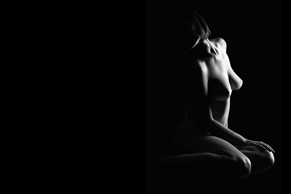 Nude on a black background
