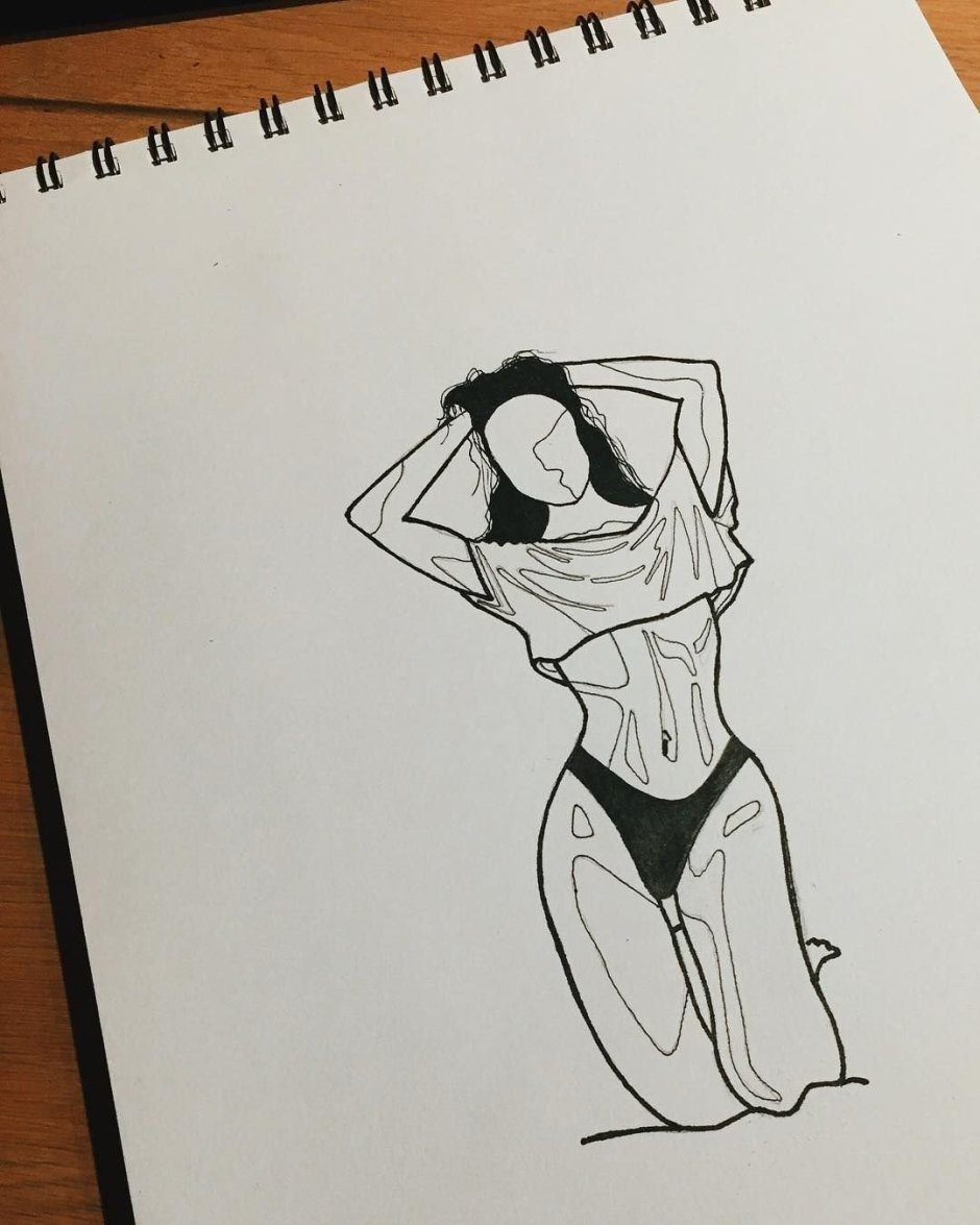 Girls with a pencil in the sketchbook