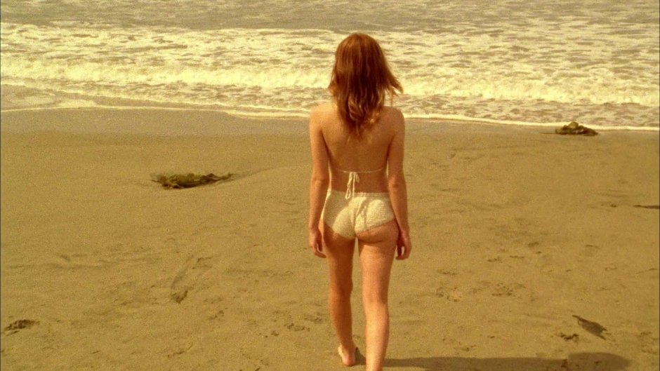 Emily Browning on the beach
