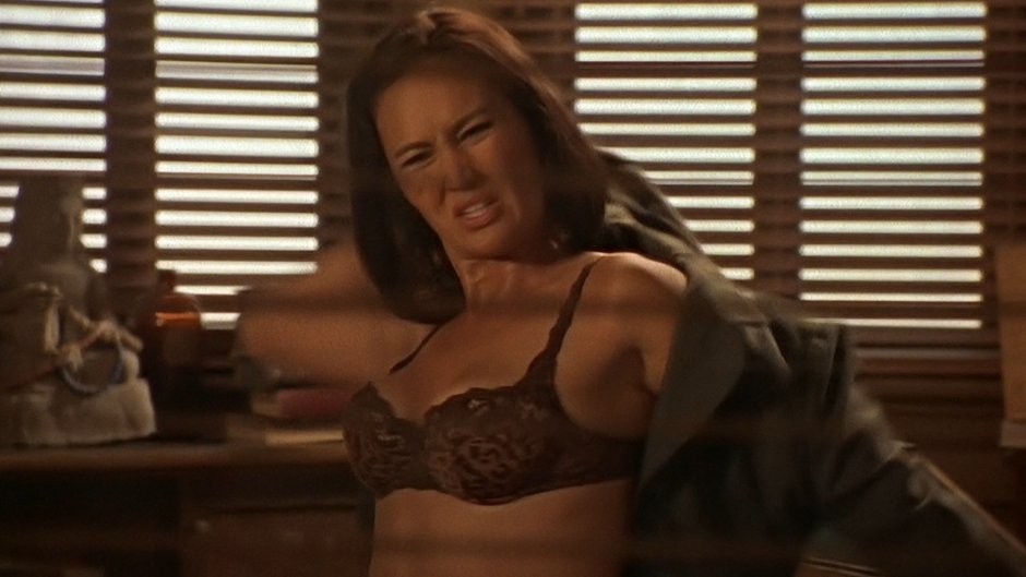 Tia Carrere bed scenes