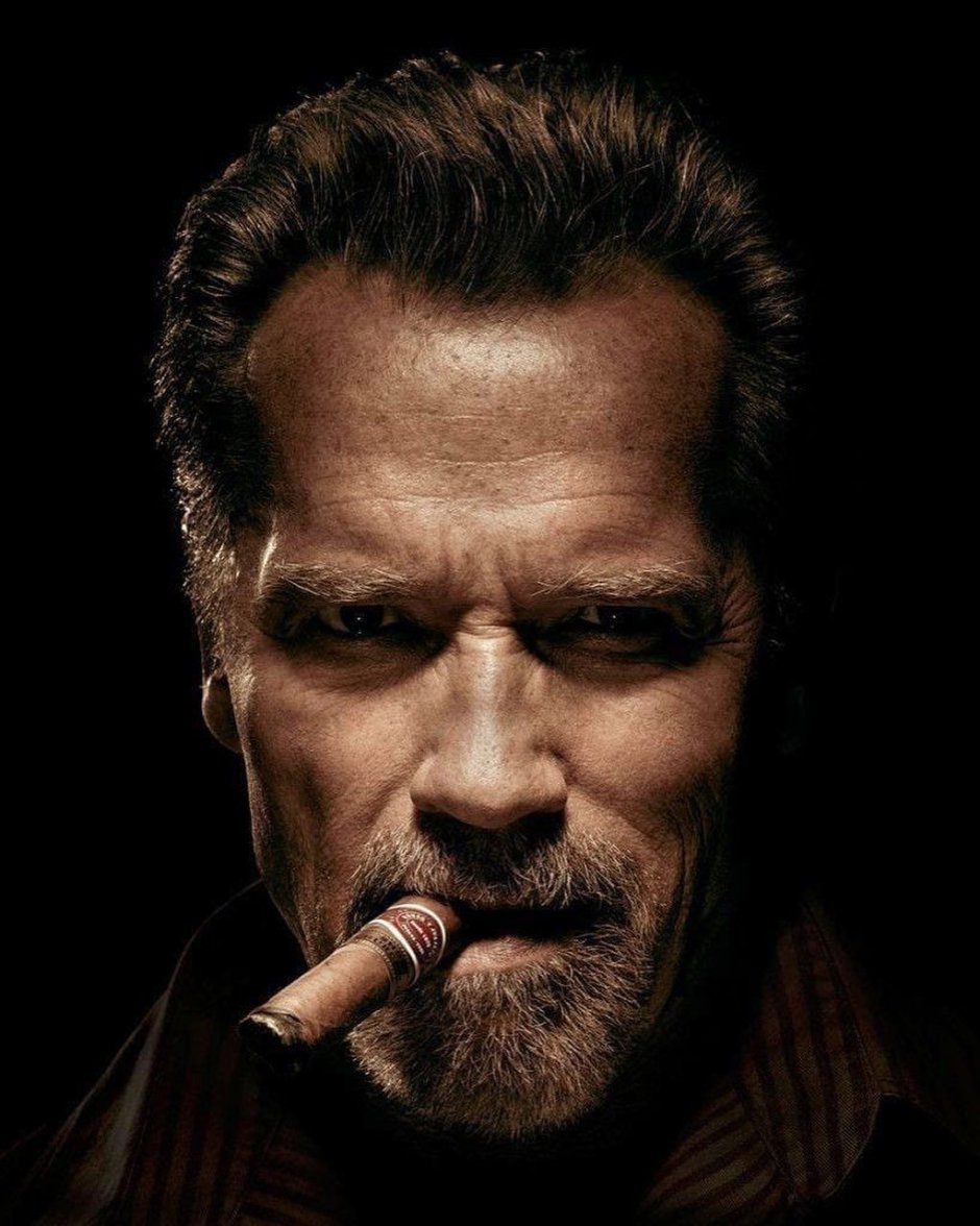 Arnold Schwarzenegger with a cigar