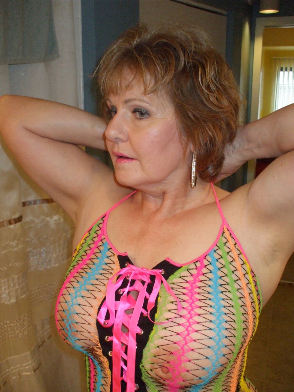 55 -year -old woman in bed