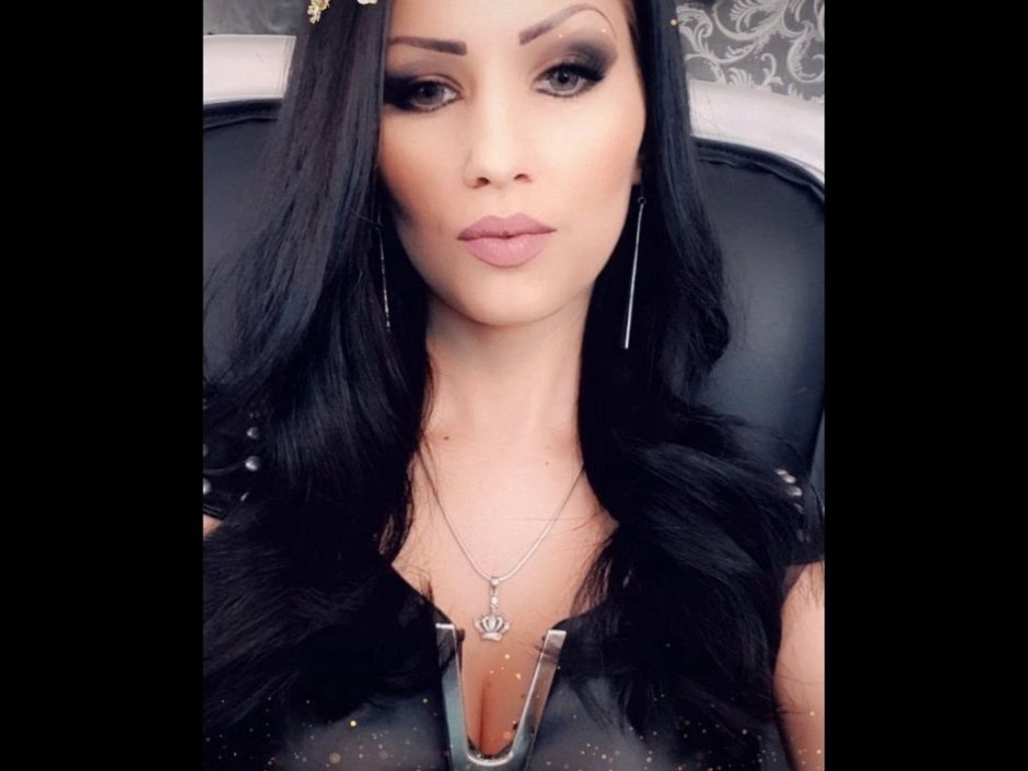 Melisa Mendiny in a dress