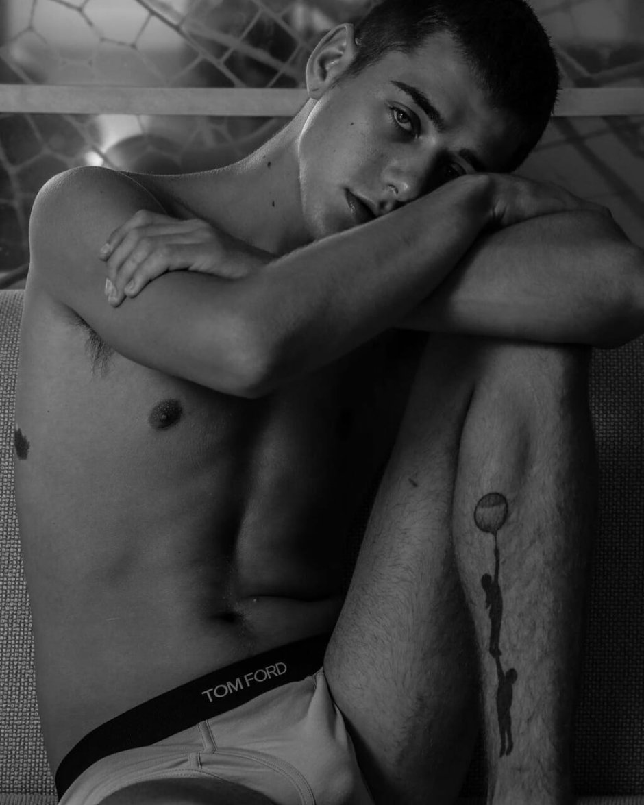 Handsome man in bed