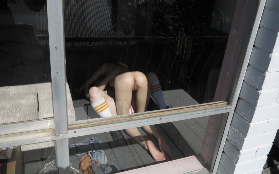 Naked on the balcony spied