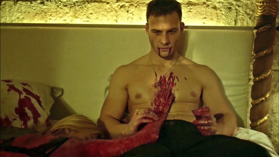 Kerem Bursin with a naked torso