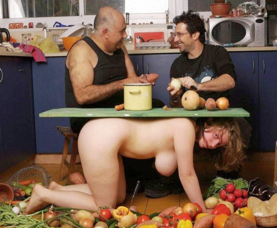 Naked woman at the table