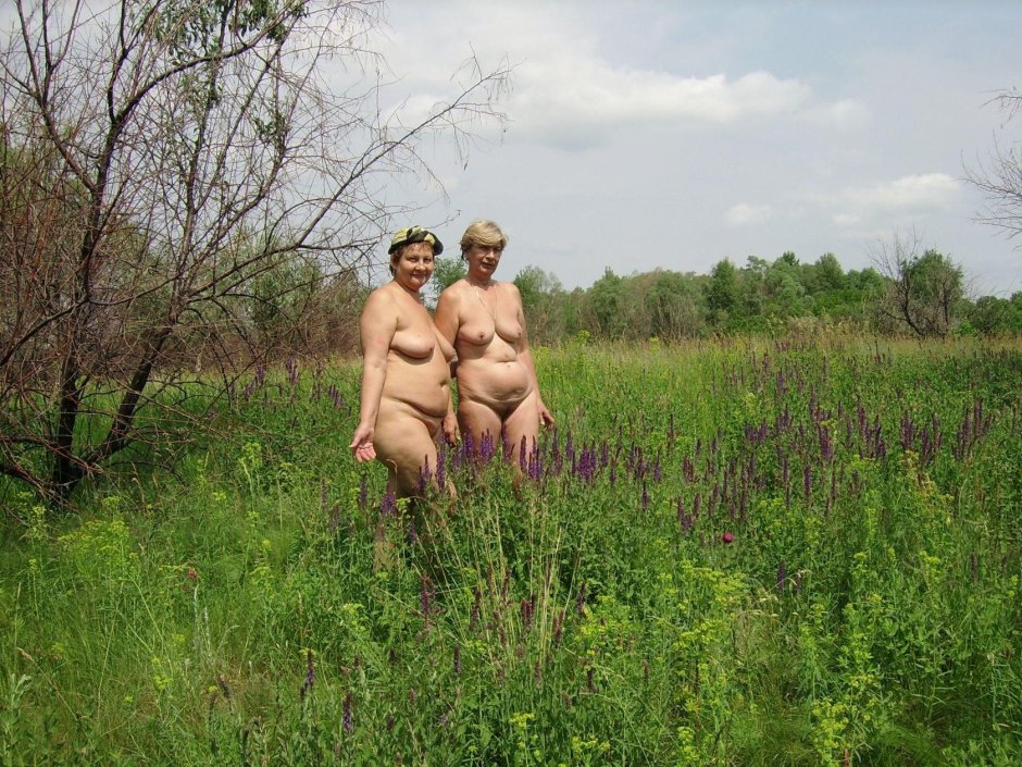 Mature nudists in nature