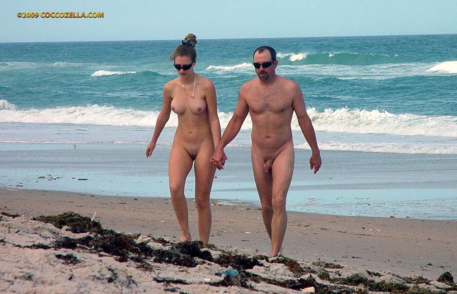 Naked families on the beach stood a member