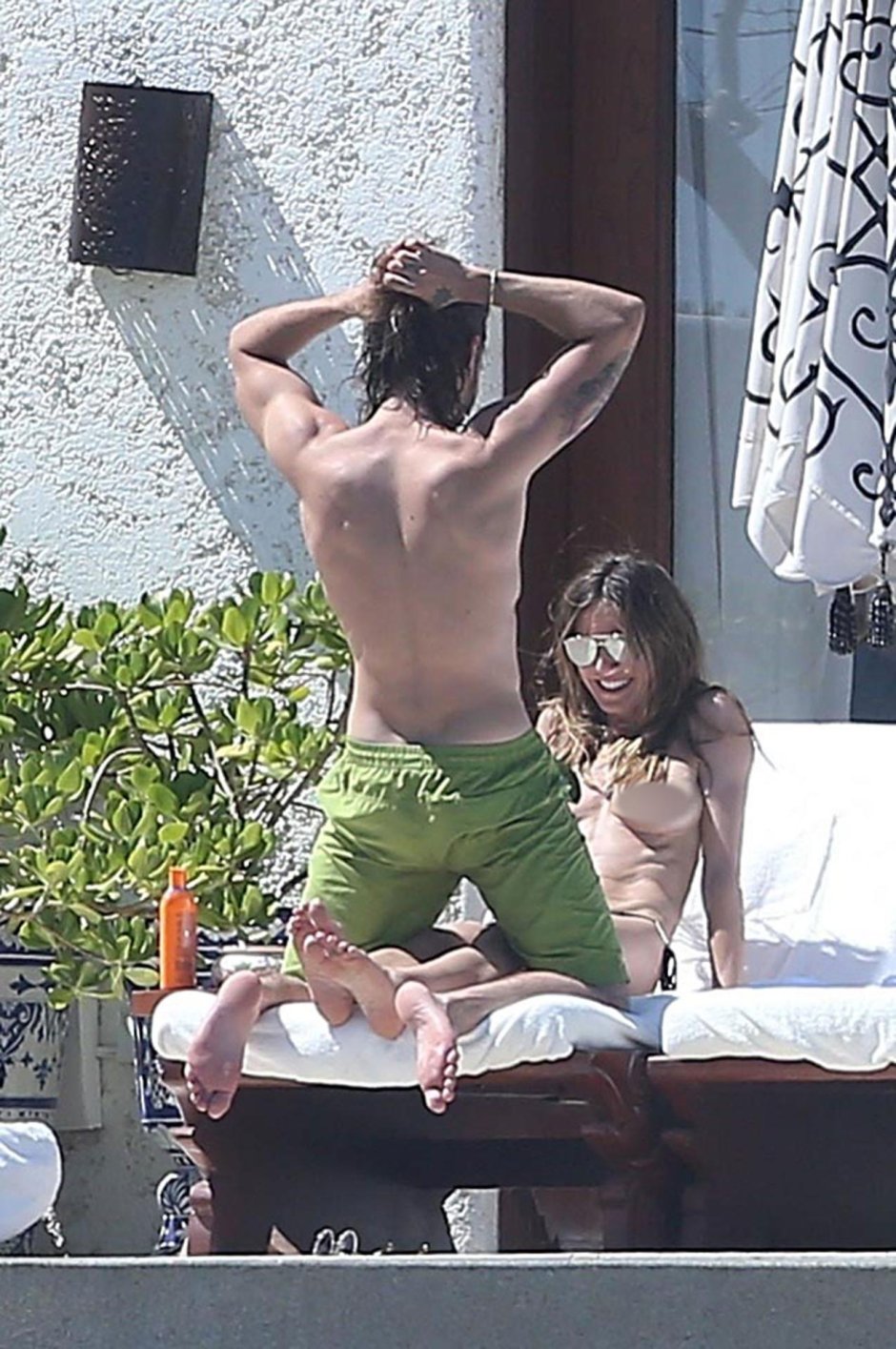Heidi Klum and Tom Kaulitz on the beach