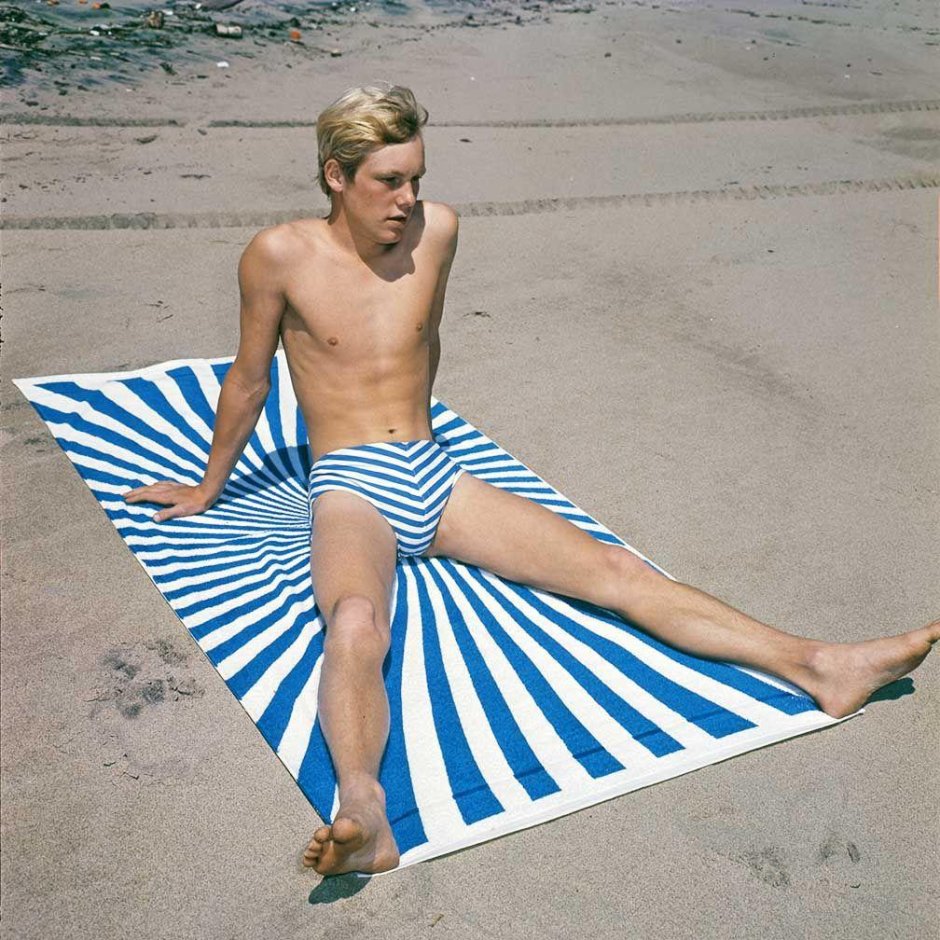 A man in striped swimsuit