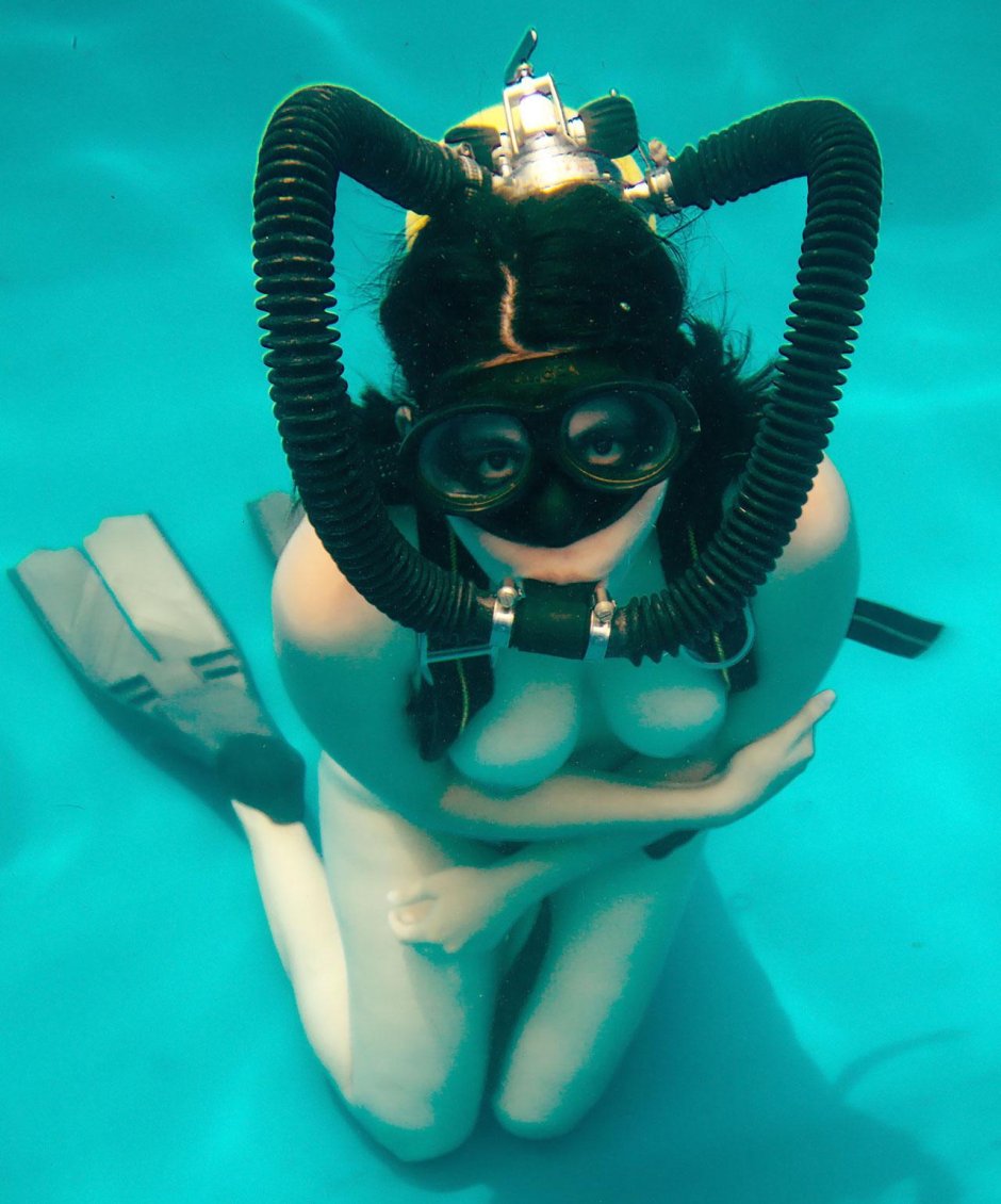 Naked women with scuba gear