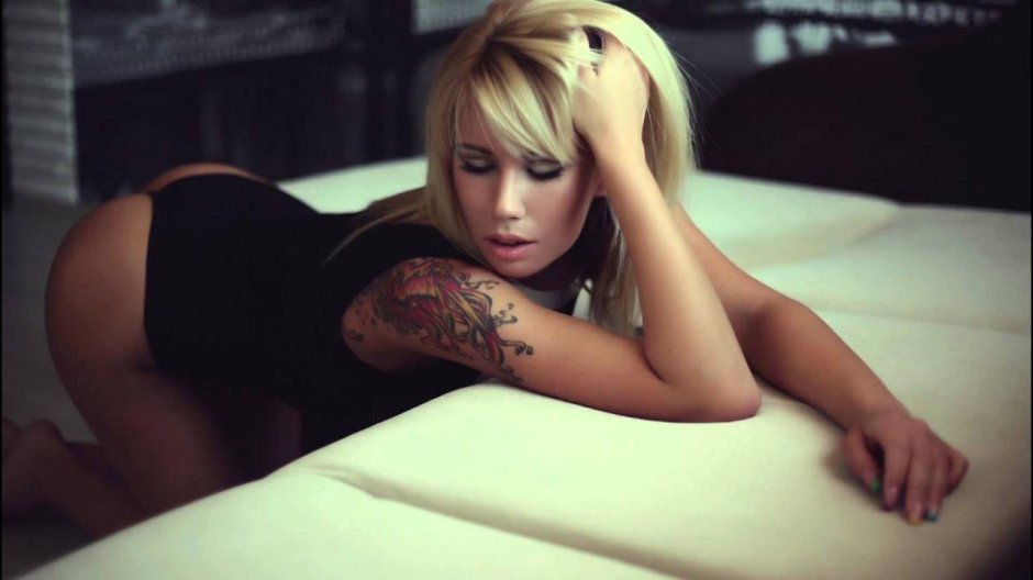 Blonde with tattoo