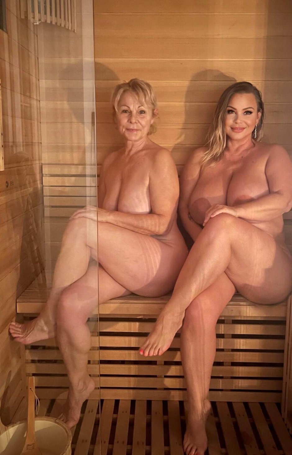 Two naked women in the bath