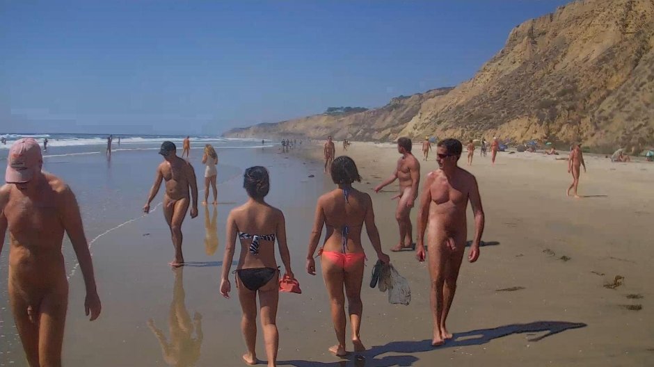 Naked guy on a public beach